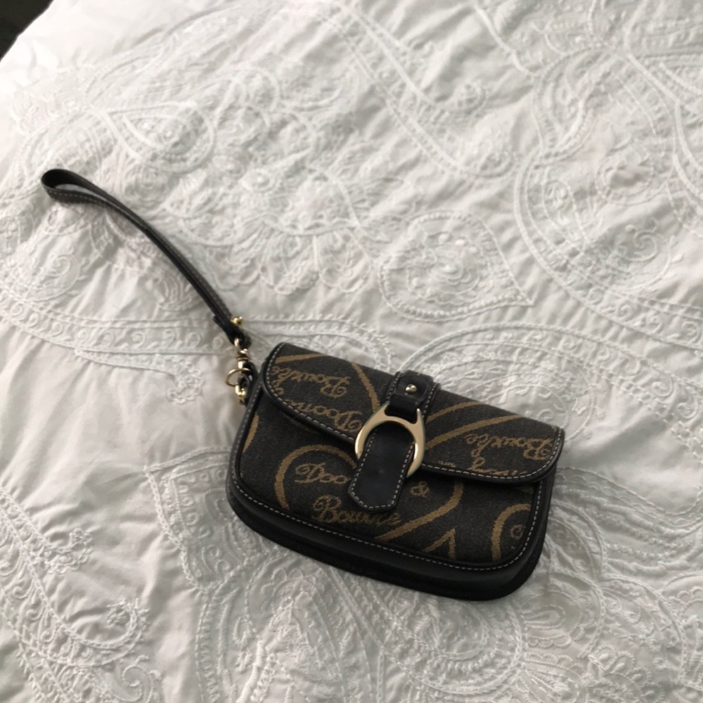 New with out tags! Dooney And Bourke wristlet.